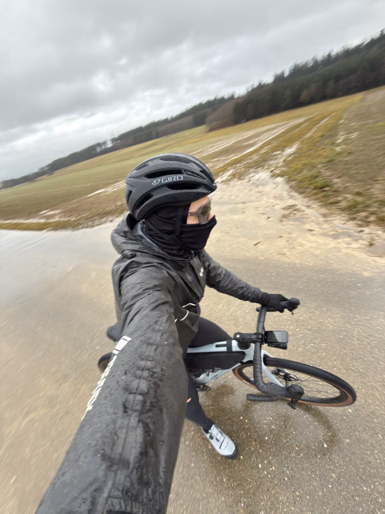 Giro Isode II MIPS helmet on a gravel bike in rain: side view