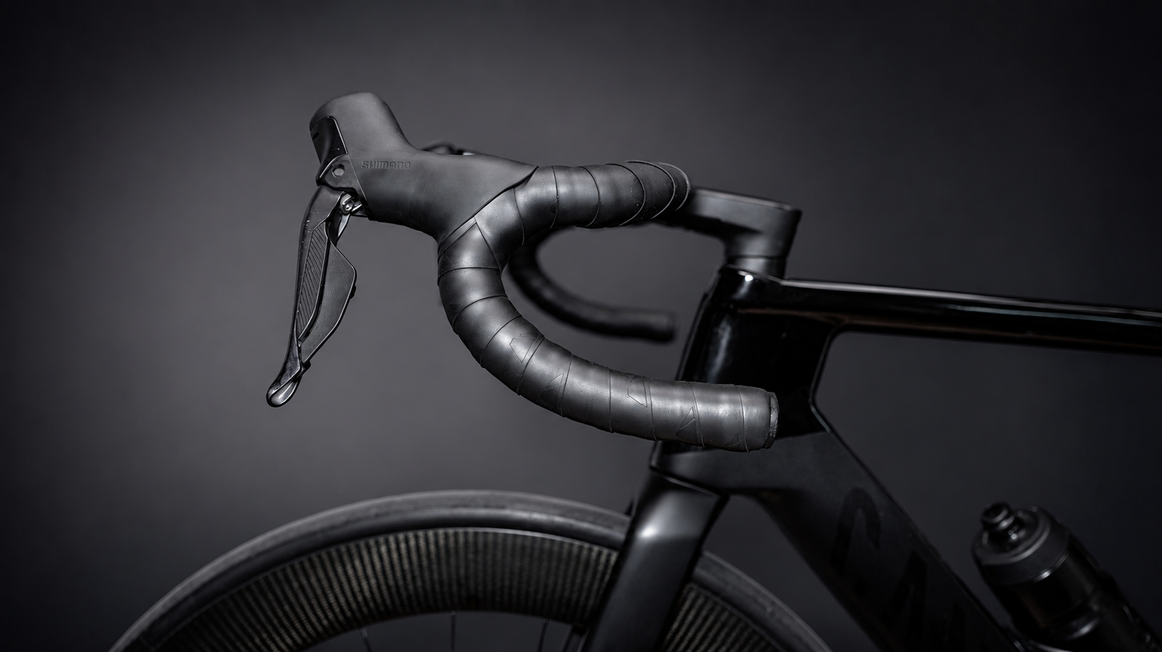 Road bike drop handlebar as an example of handlebar shape and reach