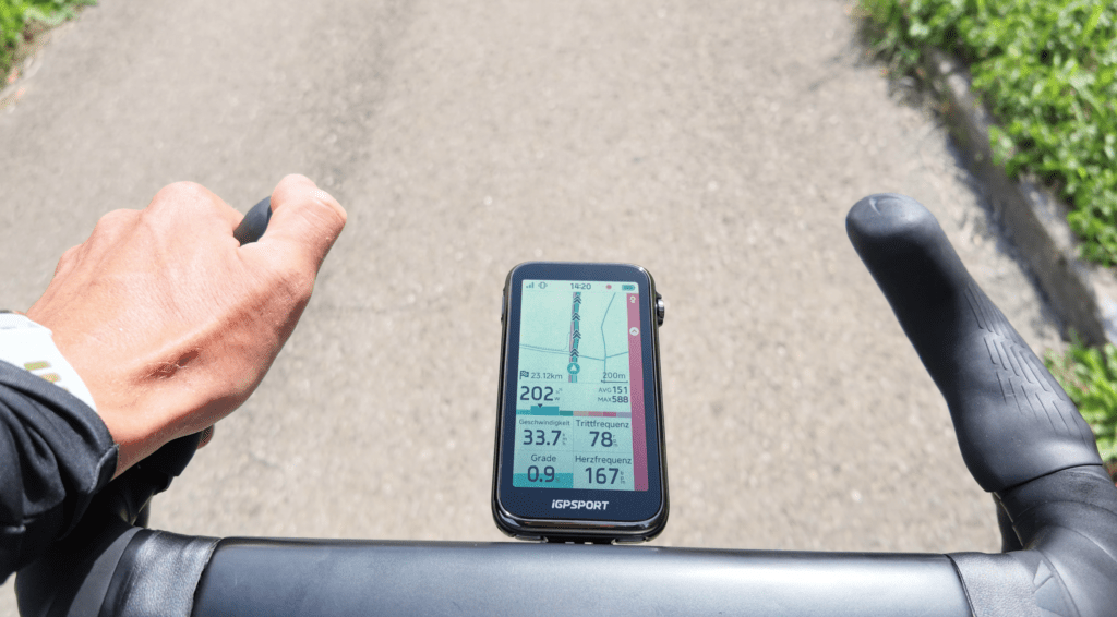 iGPSPORT BiNavi Ultra on a road bike handlebar with a radar warning display