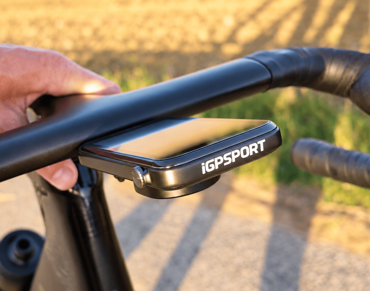 Side View of the iGPSPORT BiNavi Ultra with Scroll Wheel Beneath a Road Bike Handlebar